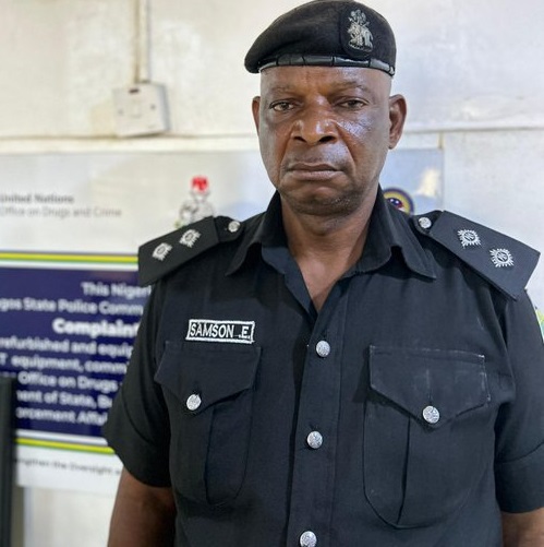 Detained police officer