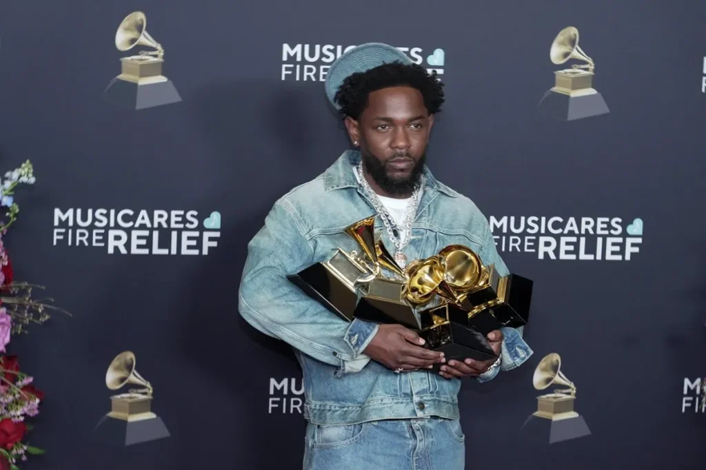 Grammy winner Kendrick Lamar poses in the press room during the 67th GRAMMY Awards 1