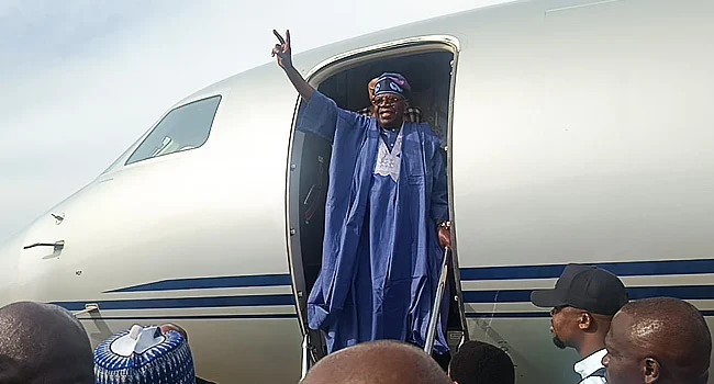 Tinubu arrives Abuja from Guinea Bissau.webp