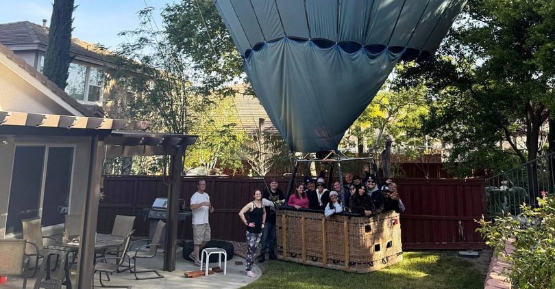 mind if we drop in hot air balloon makes emergency landing in back garden
