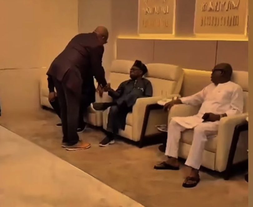 Obasanjo seated at the airport