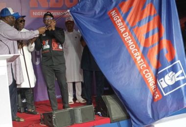Peter Obi being handed over the ADC flag by Dickson and Cleopas