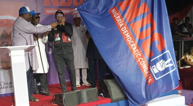 Peter Obi being handed over the ADC flag by Dickson and Cleopas