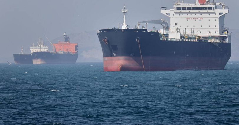 tensions flare near strait of hormuz as ship is seized and another is sunk