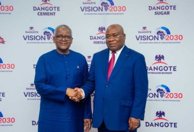 Aliko Dangote and Maixent Raoul Ominga