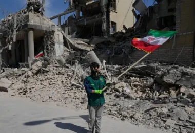 Iran flag wave e1772636011949