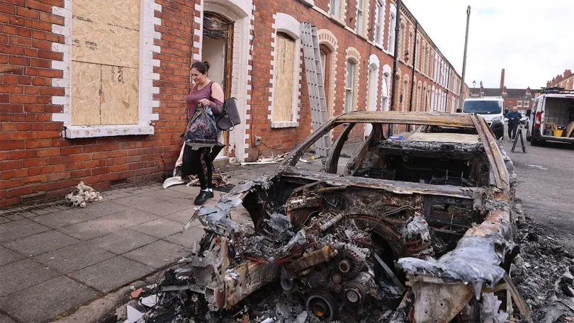 north belfast stabbing burned out car