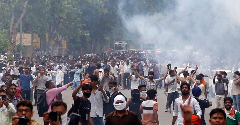 police fire tear gas at india s cockroach movement supporters