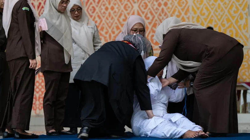 sharia indonesia caning