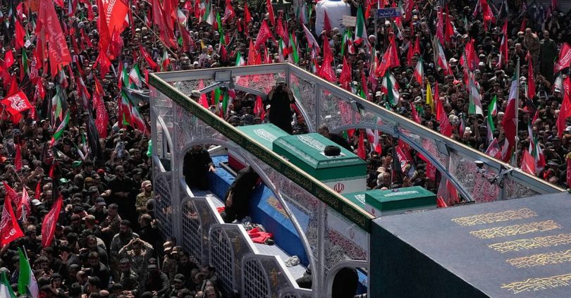 thousands line funeral procession for iranian supreme leader