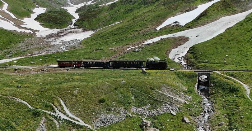 tourists mark milestone anniversary of alpine rail route seen in james bond film